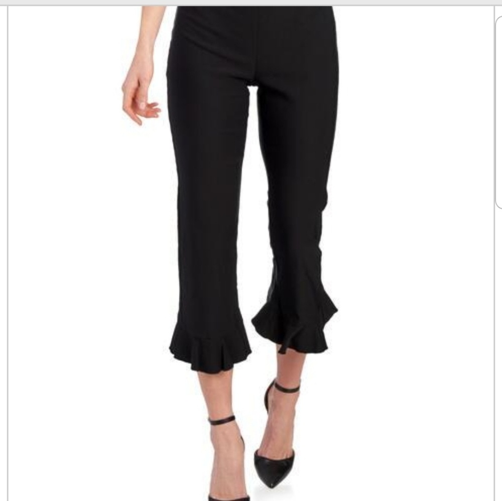 black ruffle zipper back pants size medium